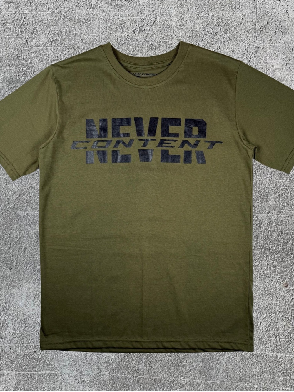 Men’s Olive Green Never Content Short Sleeve T-Shirt Size Medium